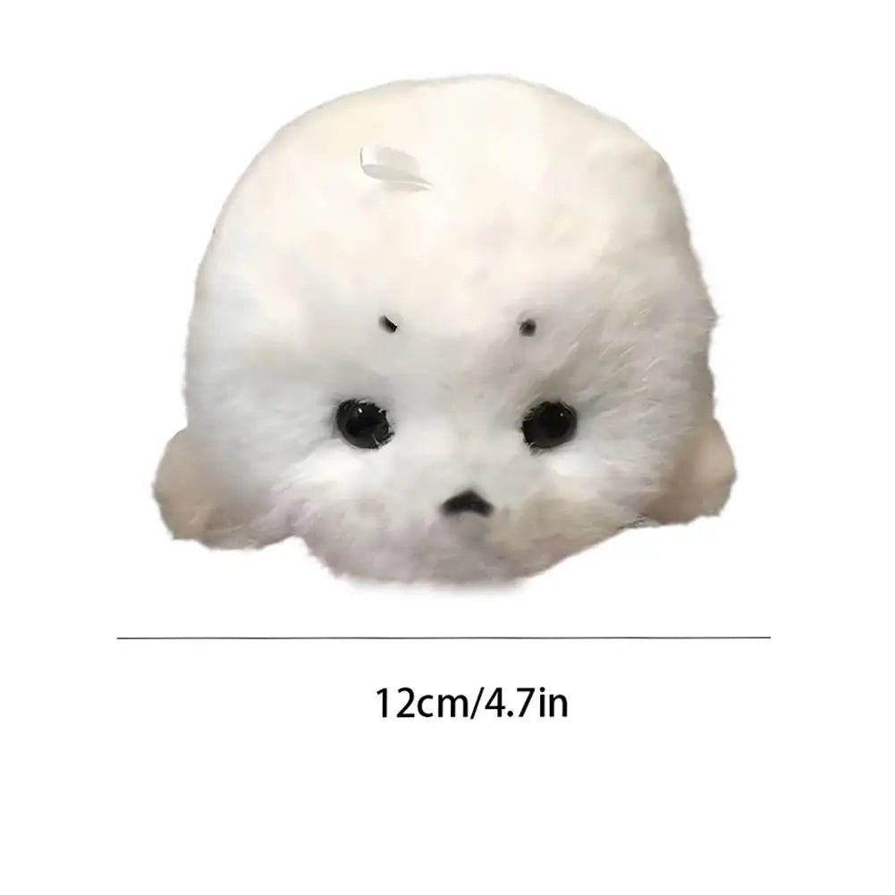 A cute marine-animal accessory for bags, backpacks, car keys, and cozy everyday decor.