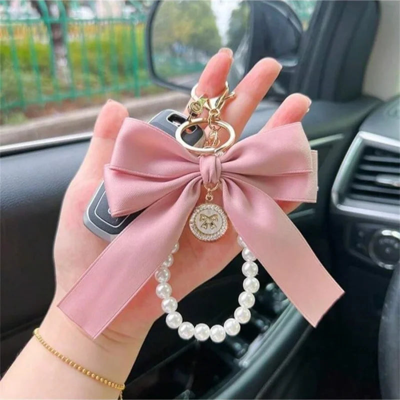 A stylish decorative charm for handbags, backpacks, headphone cases, and everyday accessories.