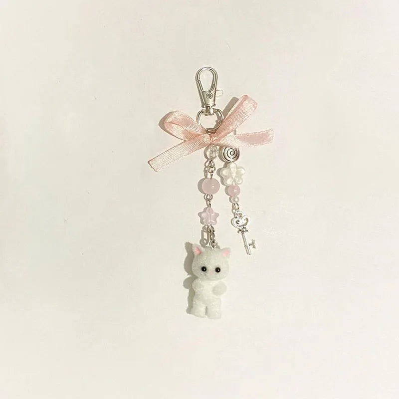 A cute matching accessory for bags, backpacks, keys, and everyday gifting.