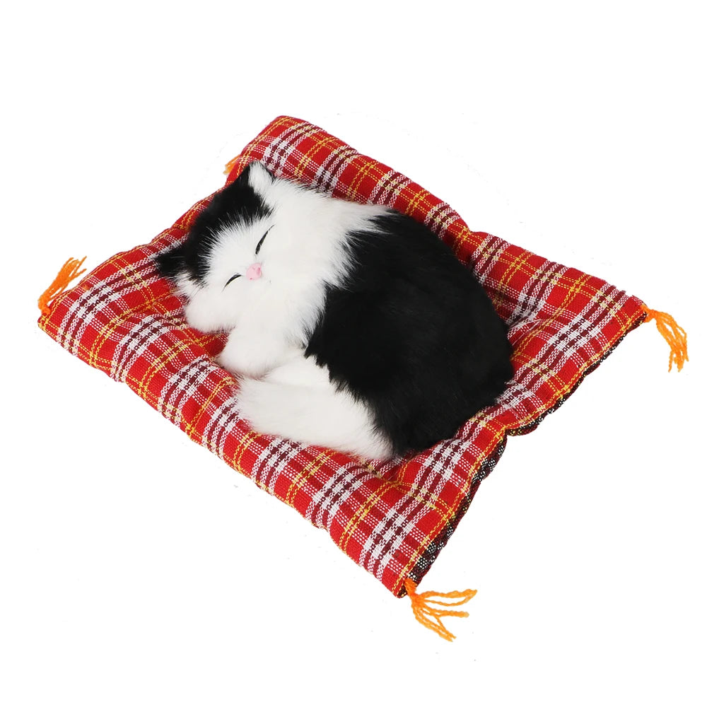 A cute miniature cat decoration for car dashboards, desks, shelves, and home spaces.