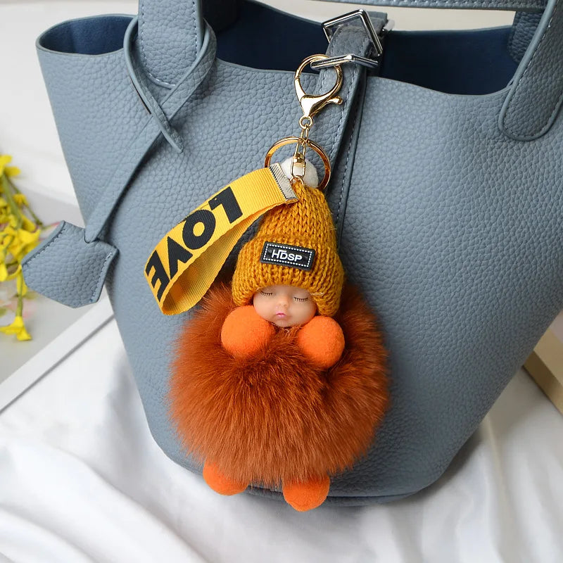 A charming plush accessory for handbags, school bags, wallets, car keys, and everyday gifting.