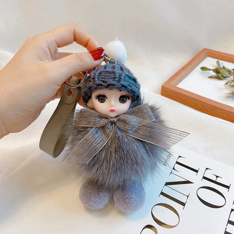 A charming plush accessory for handbags, school bags, wallets, car keys, and everyday gifting.