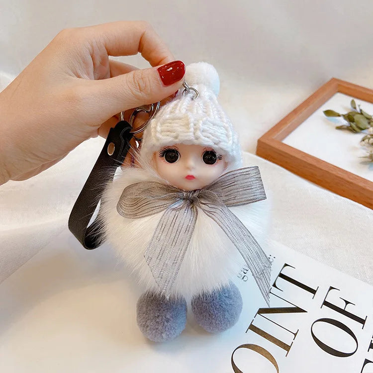 A charming plush accessory for handbags, school bags, wallets, car keys, and everyday gifting.