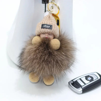 A charming plush accessory for handbags, school bags, wallets, car keys, and everyday gifting.