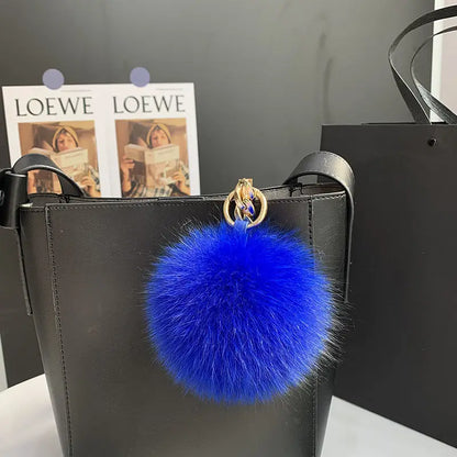 A stylish accessory for handbags, backpacks, keys, and everyday fashion.