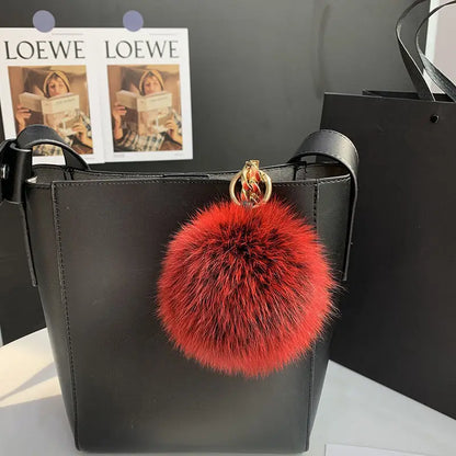 A stylish accessory for handbags, backpacks, keys, and everyday fashion.