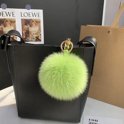 A stylish accessory for handbags, backpacks, keys, and everyday fashion.