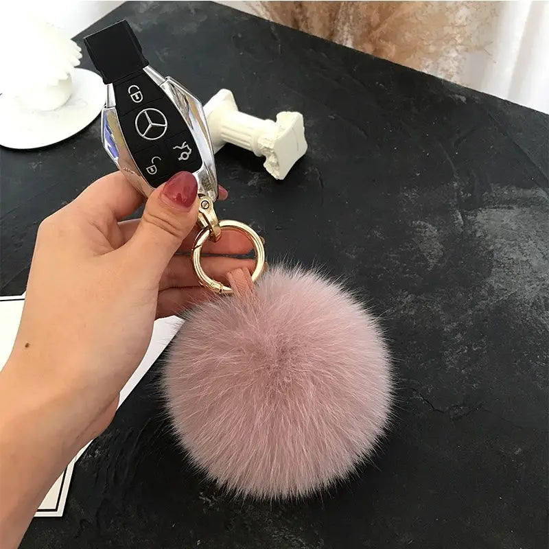 A stylish accessory for handbags, backpacks, keys, and everyday fashion.