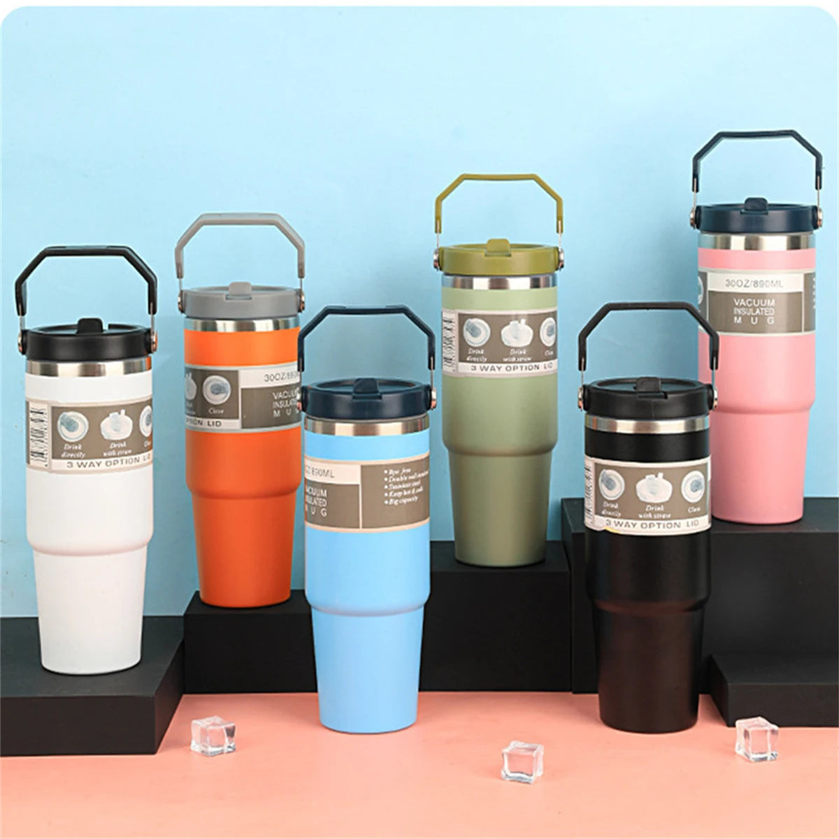A portable stainless steel tumbler with a convenient handle for travel, work, commuting, and everyday hydration.