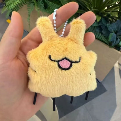 A soft collectible accessory for bags, backpacks, keys, and playful everyday gifting.