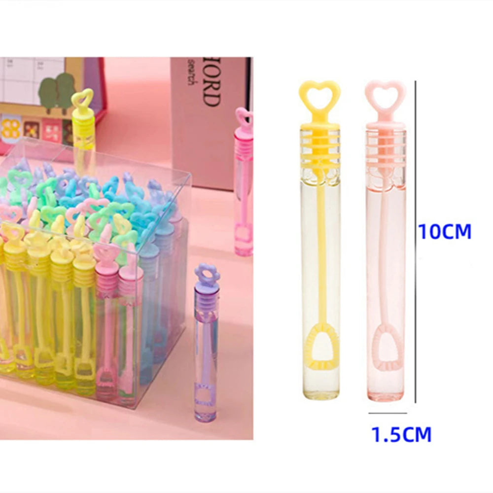Colorful bubble wands in clear packaging with measurements on a white background