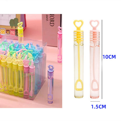 Colorful bubble wands in clear packaging with measurements on a white background