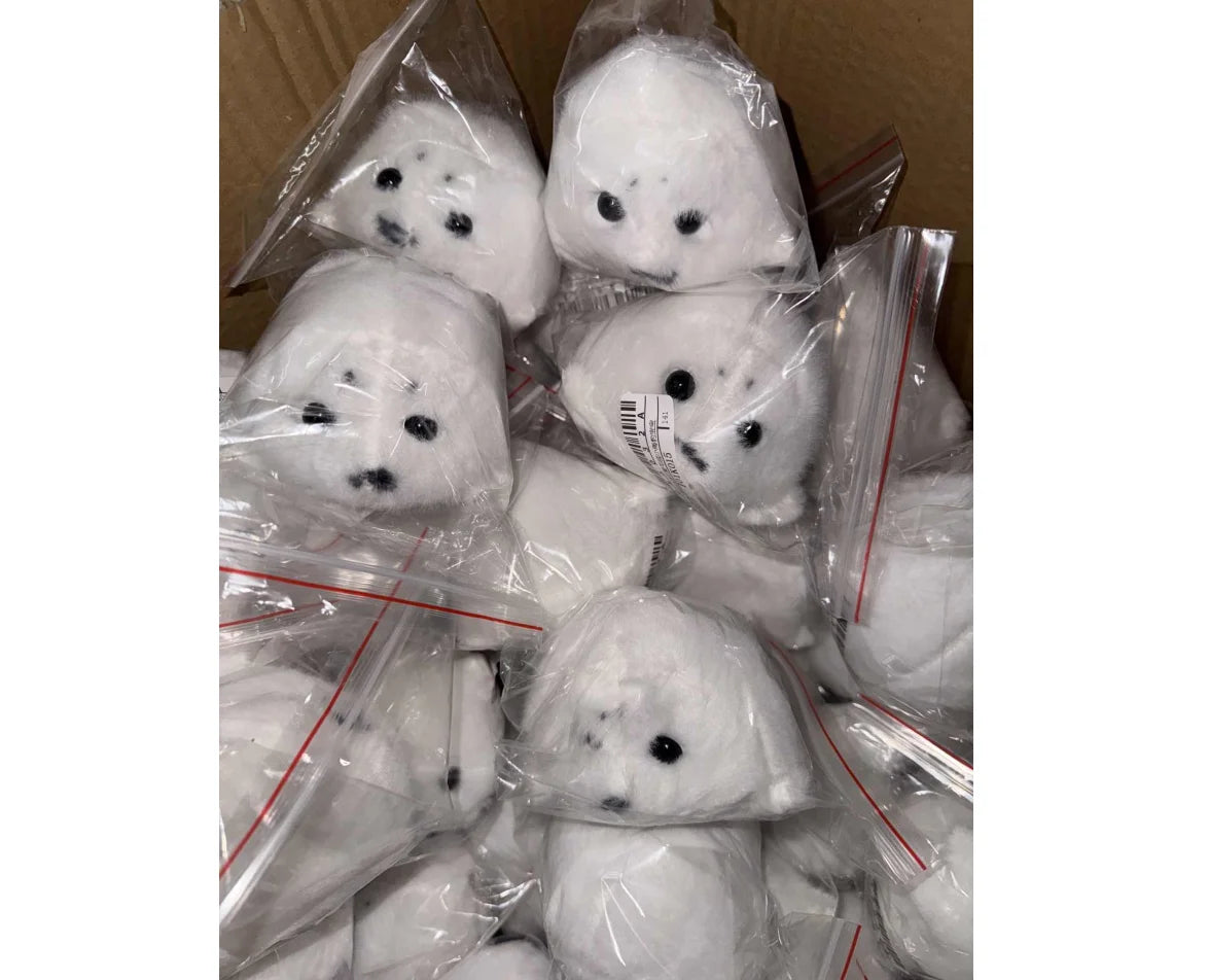 A cute marine-animal accessory for bags, backpacks, car keys, and cozy everyday decor.